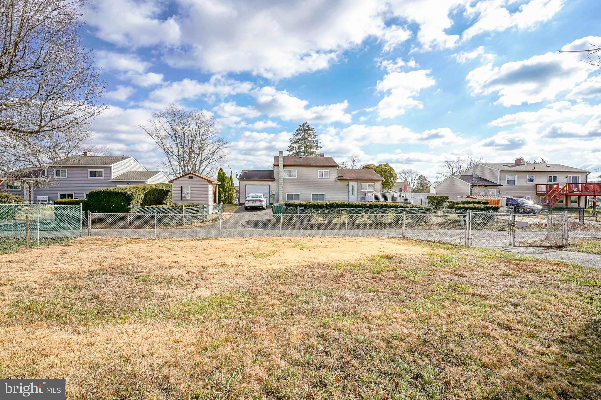 220 College Drive Pemberton, NJ 08068 - Photo 27 of 28 a swimming pool with outdoor seating and yard