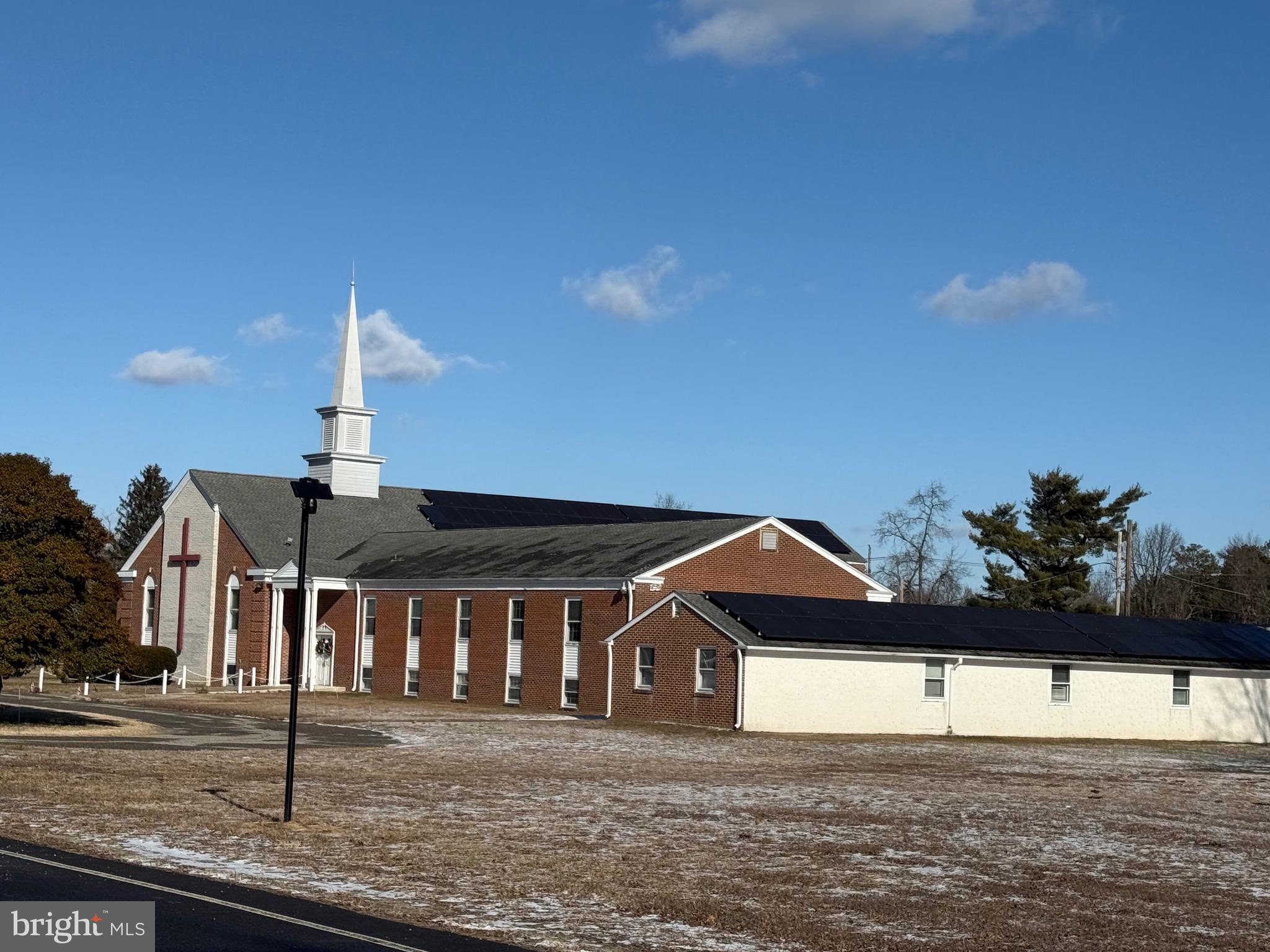 220 College Drive Pemberton, NJ 08068 - Photo 7 of 11 a front view of a house with a yard