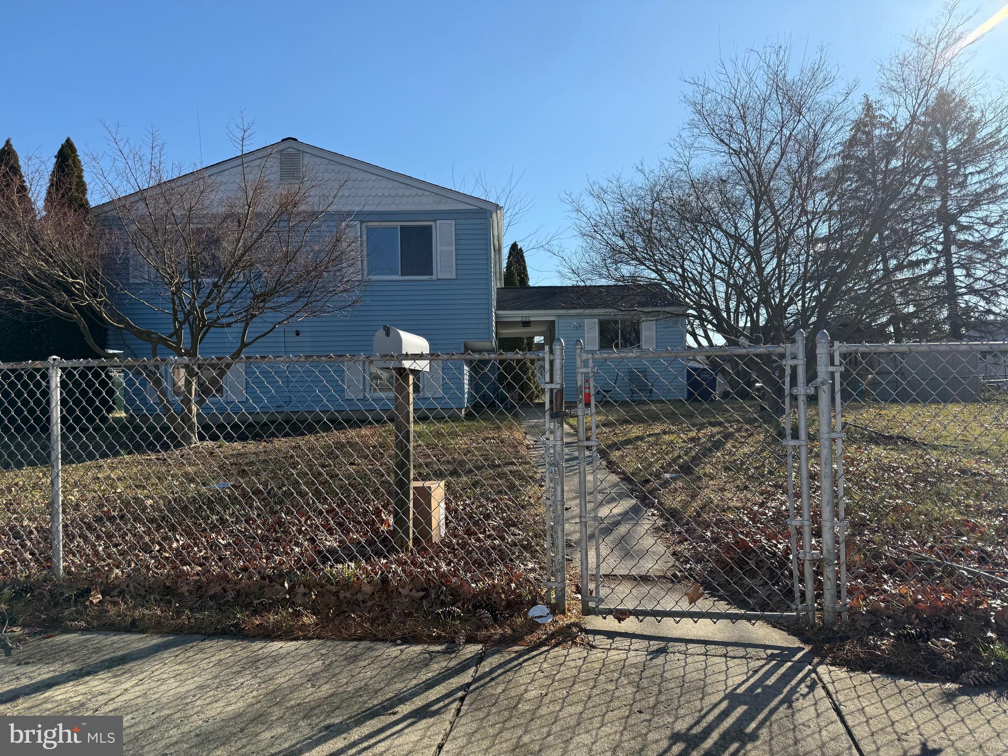 220 College Drive Pemberton, NJ 08068 - Photo 10 of 11 a view of a house with a yard