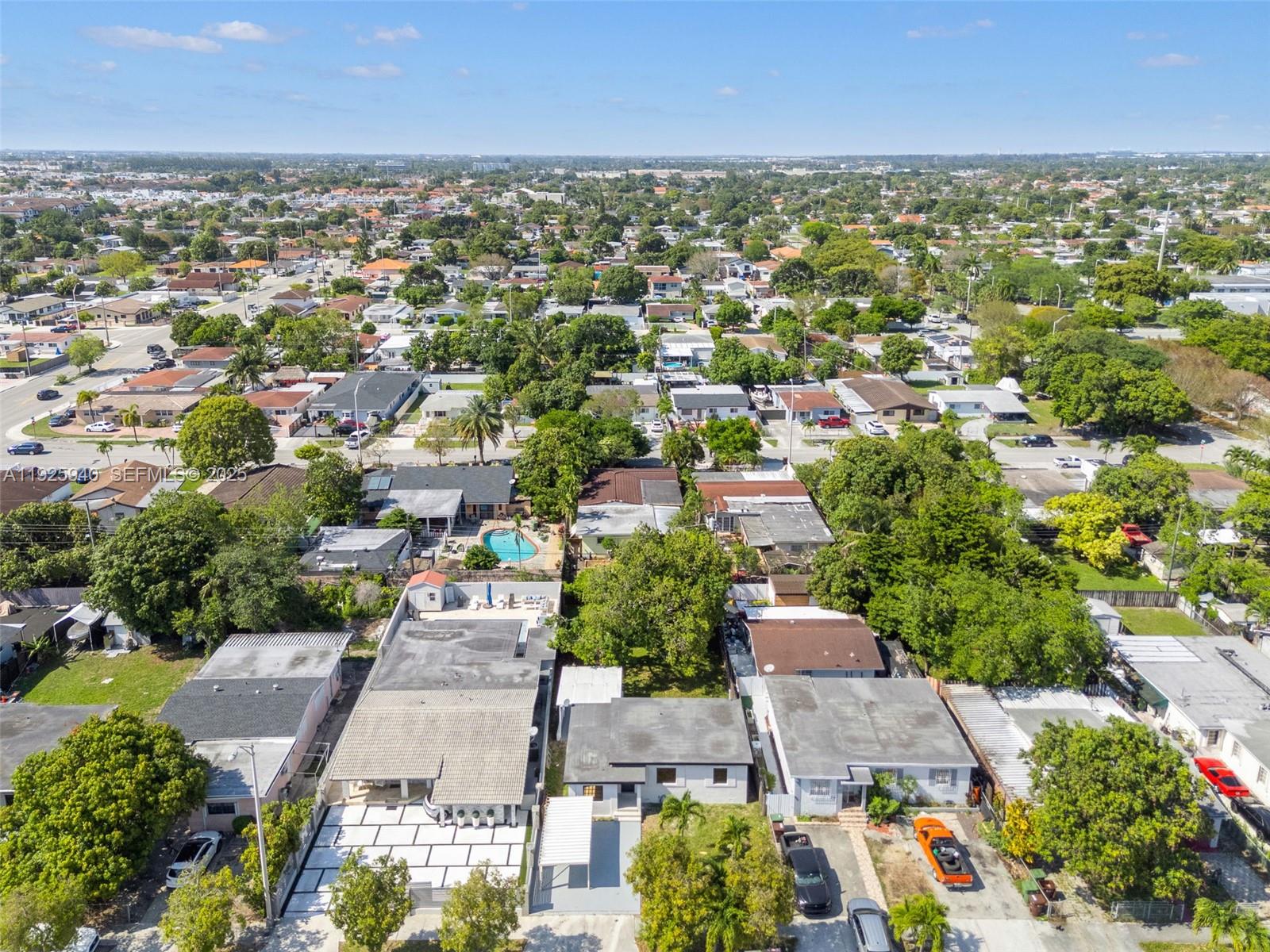 739 West 30th Street Hialeah, FL 33012 - Photo 19 of 23 an aerial view of residential houses with outdoor space