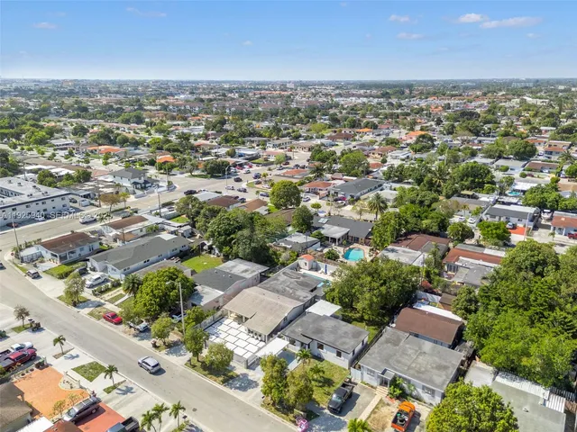 an aerial view of a city with lots of residential buildings