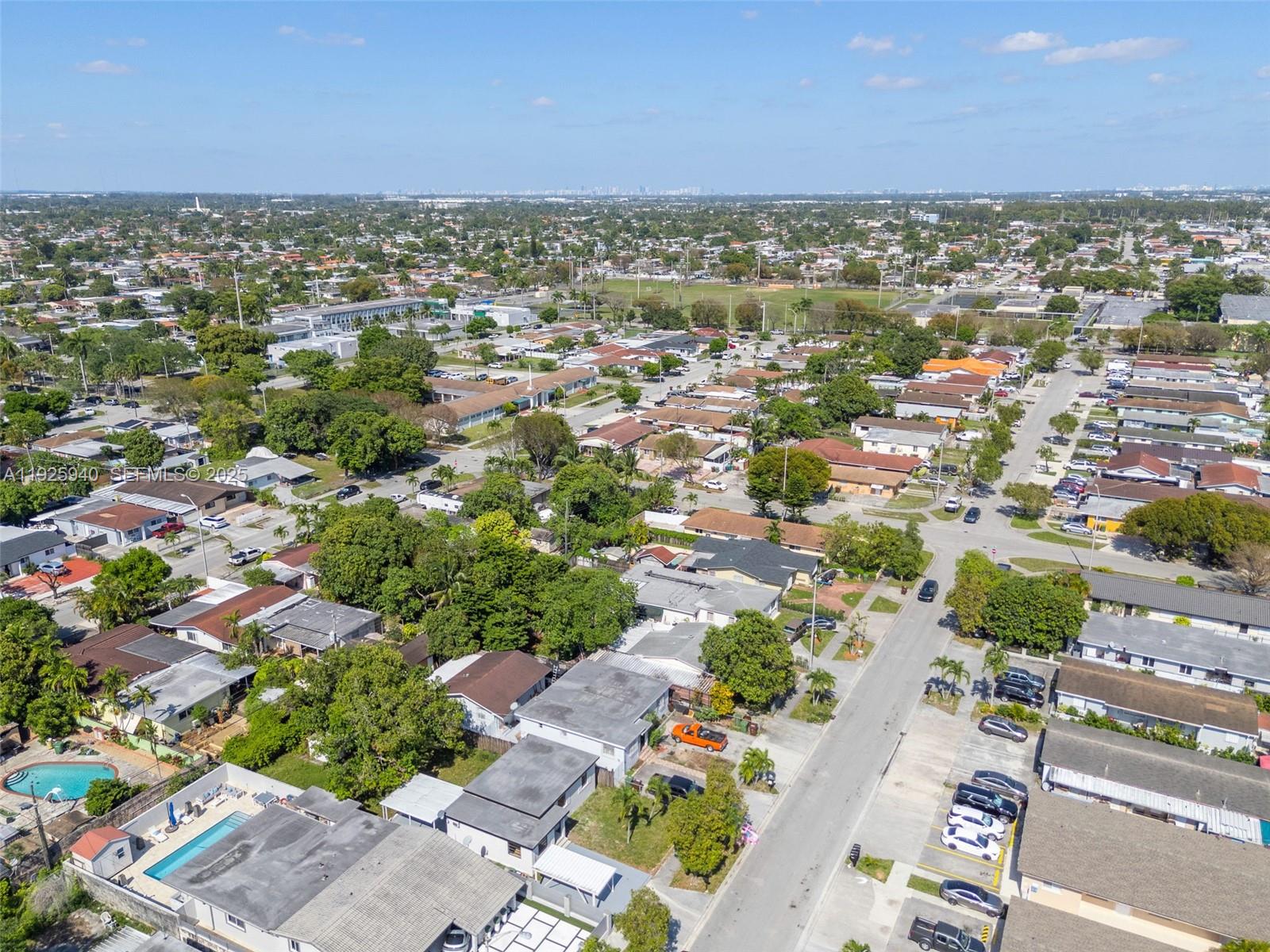 739 West 30th Street Hialeah, FL 33012 - Photo 23 of 23 an aerial view of residential houses with outdoor space