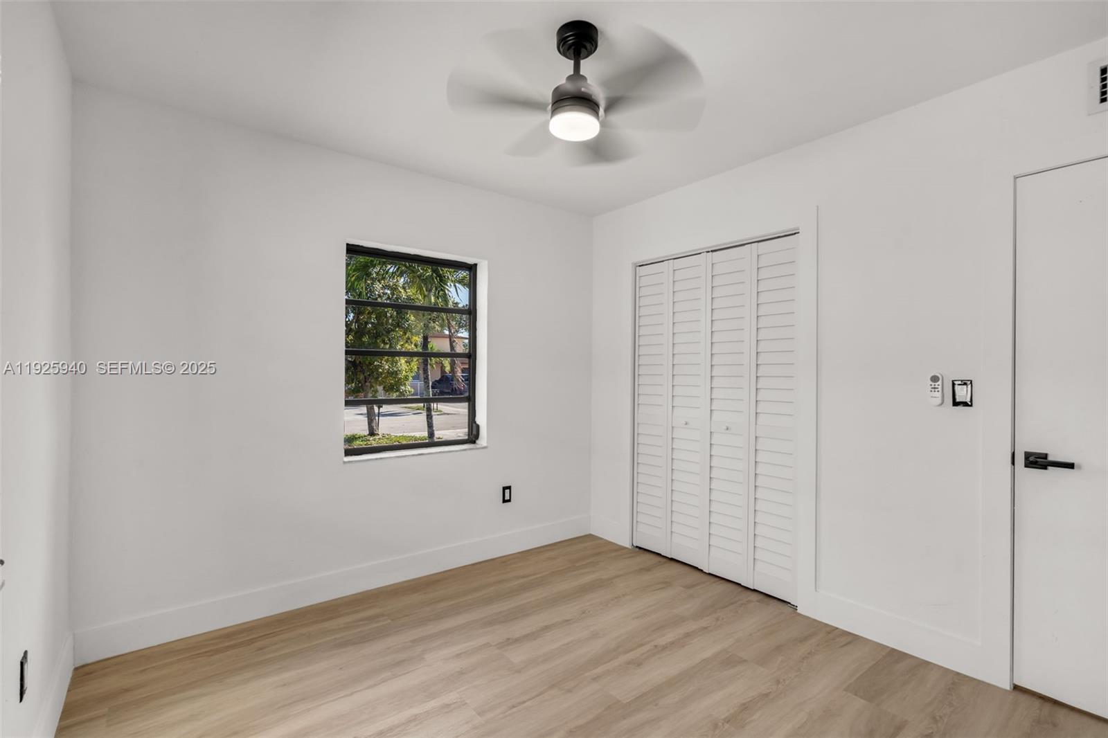 739 West 30th Street Hialeah, FL 33012 - Photo 9 of 23 a view of an empty room with a window