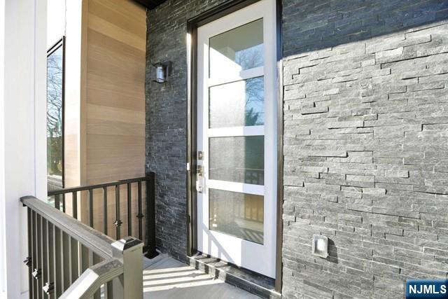 463 Roff Avenue, Unit B Palisades Park, NJ 07650 - Photo 21 of 23 a view of balcony with wooden floor