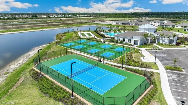 a view of a balcony with two chairs and a table