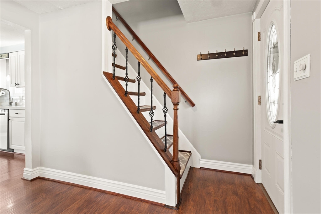 19 Cherry Street Hudson, MA 01749 - Photo 17 of 28 a view of an entryway with wooden floor
