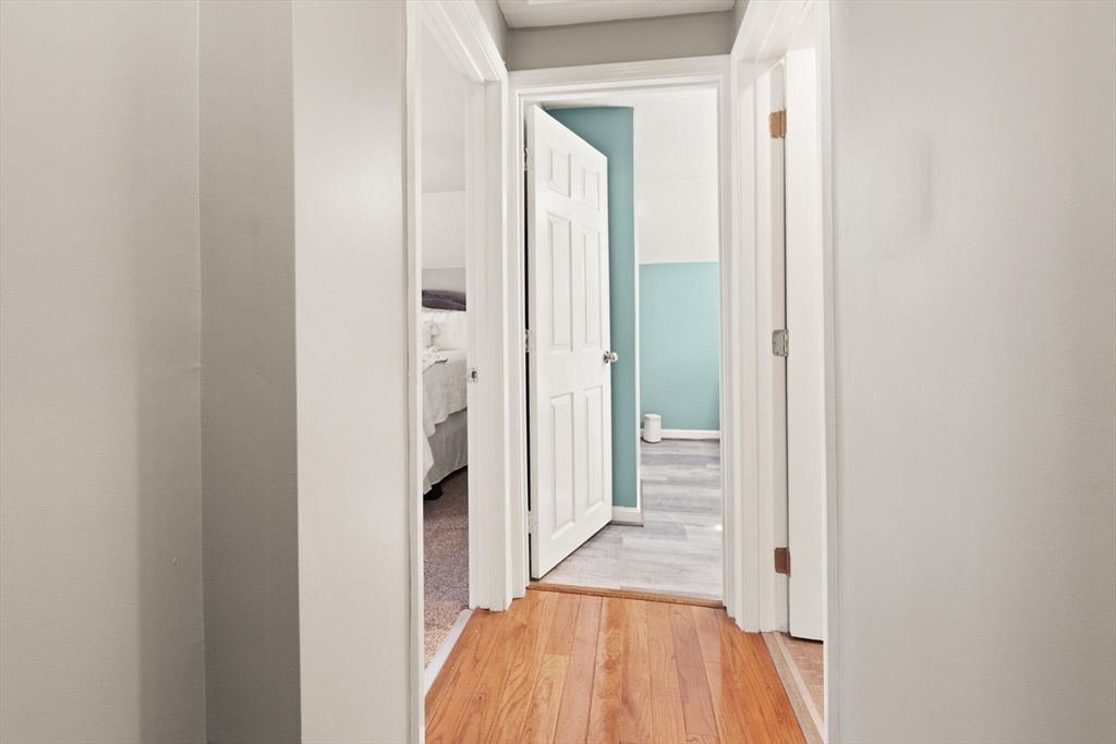19 Cherry Street Hudson, MA 01749 - Photo 18 of 28 a view of a bathroom from a hallway