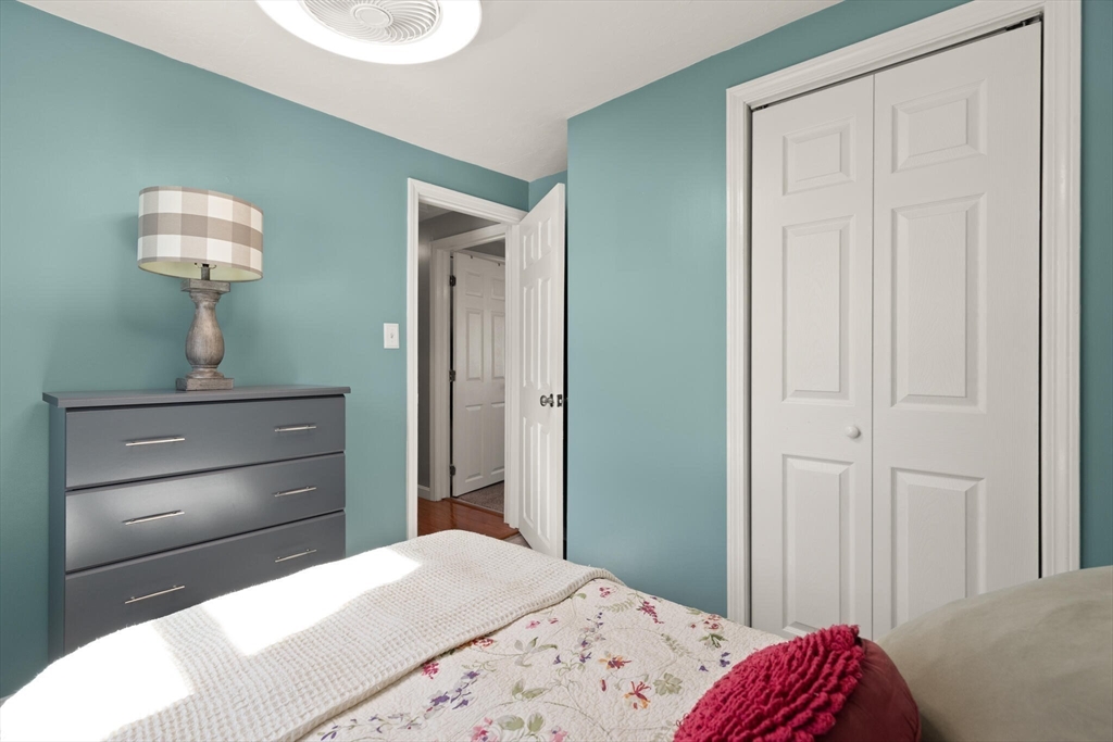 19 Cherry Street Hudson, MA 01749 - Photo 20 of 28 a bedroom with a bed and a dresser