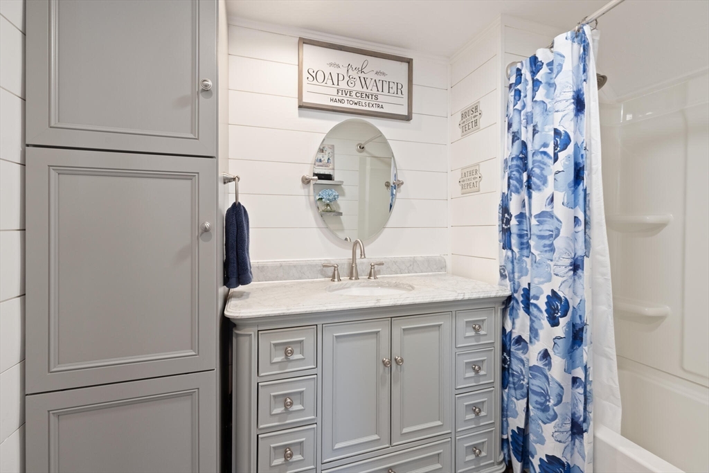 19 Cherry Street Hudson, MA 01749 - Photo 23 of 28 a close view of a sink and cabinets