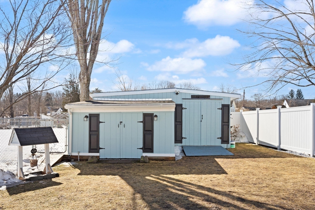 19 Cherry Street Hudson, MA 01749 - Photo 26 of 28 a view of a house with backyard