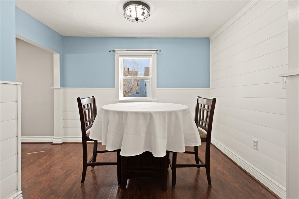 19 Cherry Street Hudson, MA 01749 - Photo 8 of 28 a view of a dining room with furniture and wooden floor