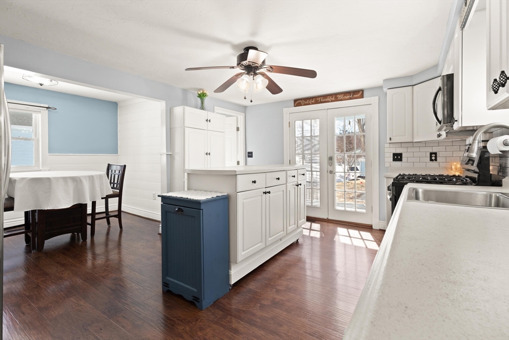 19 Cherry Street Hudson, MA 01749 - Photo 10 of 28 a view of a dining room with furniture window and wooden floor