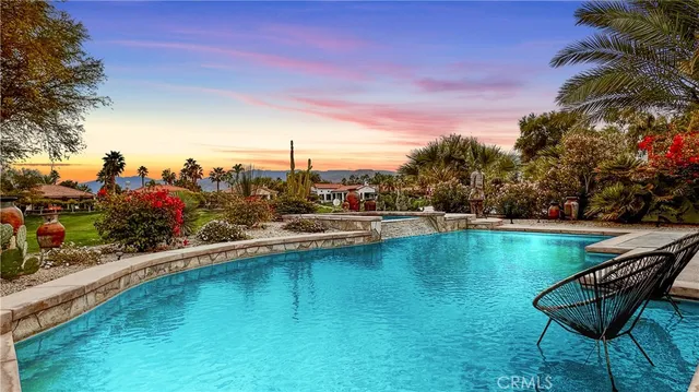 a view of swimming pool from a lake