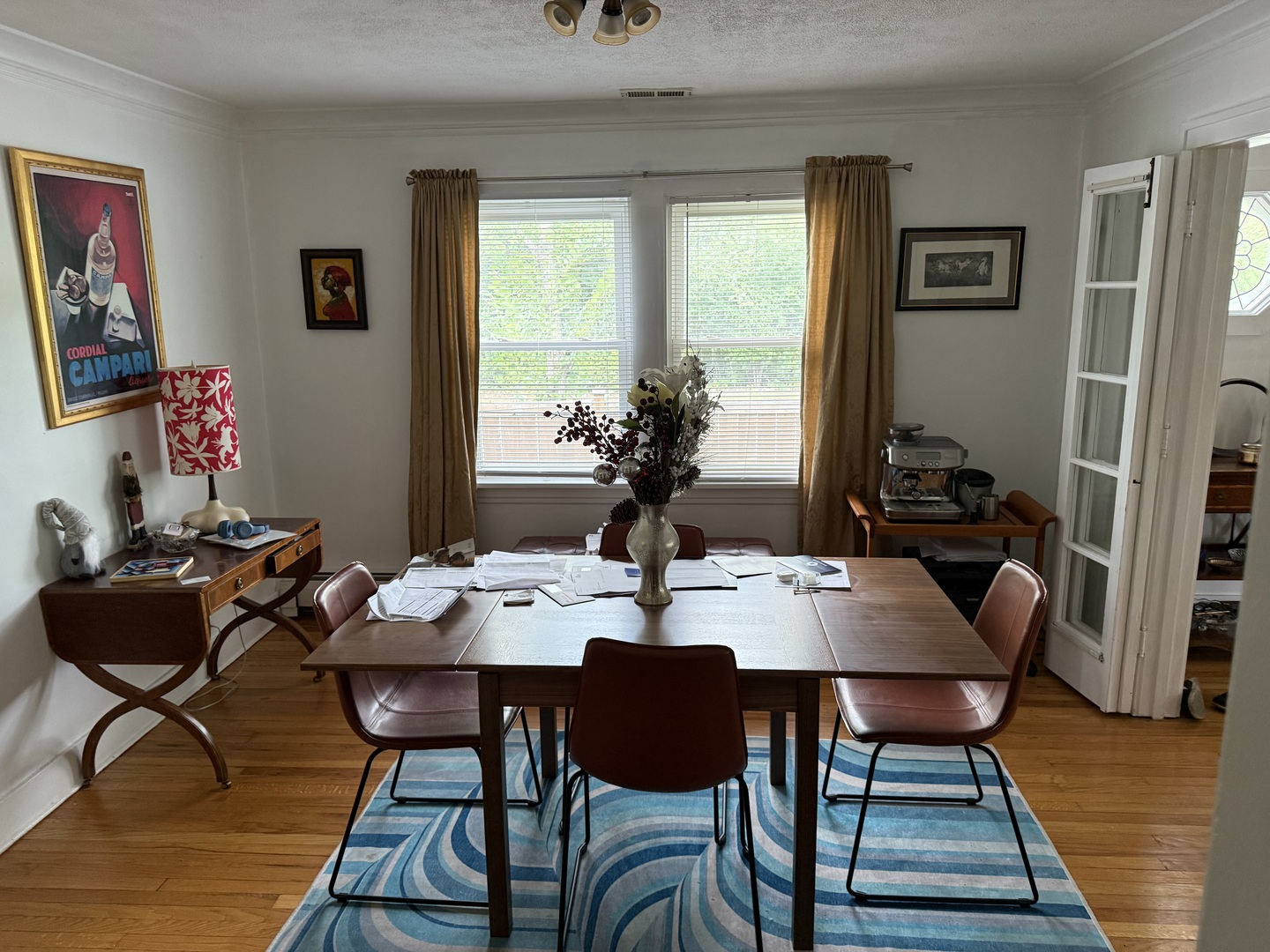 979 Vine Street Winnetka, IL 60093 - Photo 4 of 18 a view of a dining room with furniture and wooden floor