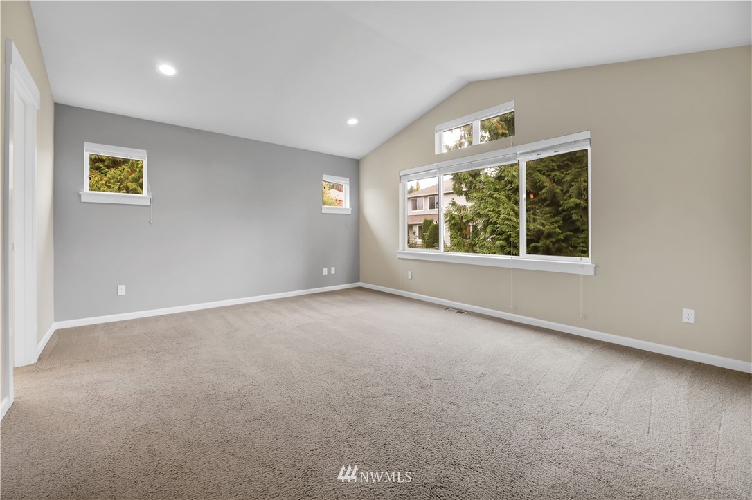 6117 Northeast 1st Street Renton, WA 98059 - Photo 16 of 39 a view of an empty room with a window