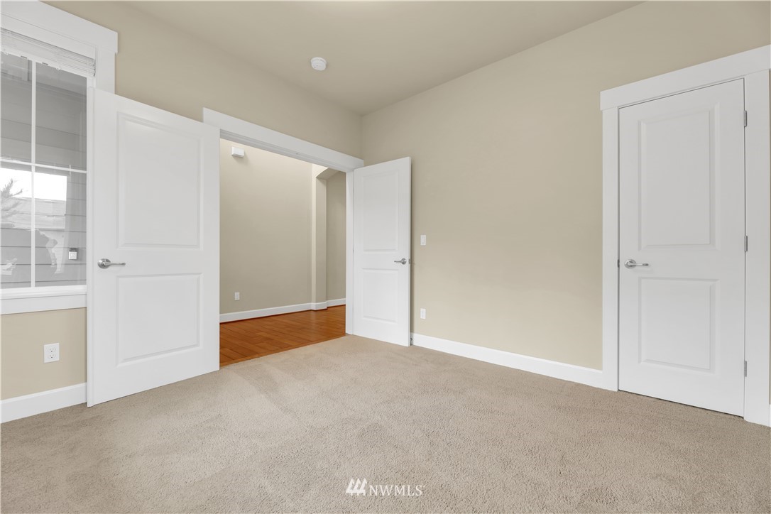 6117 Northeast 1st Street Renton, WA 98059 - Photo 3 of 39 an empty room with windows