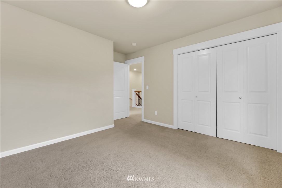 6117 Northeast 1st Street Renton, WA 98059 - Photo 22 of 39 a view of an empty room