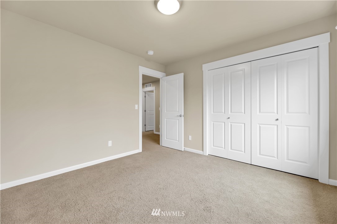6117 Northeast 1st Street Renton, WA 98059 - Photo 24 of 39 a view of an empty room and closet area