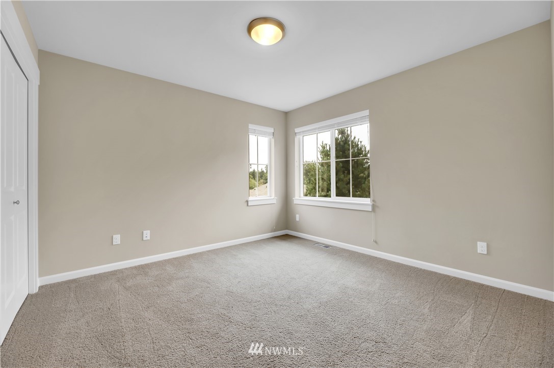 6117 Northeast 1st Street Renton, WA 98059 - Photo 28 of 39 an empty room with a window