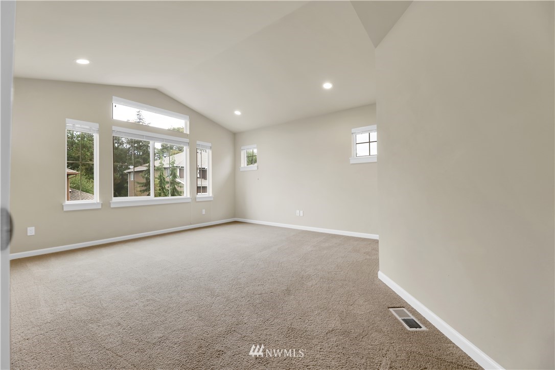 6117 Northeast 1st Street Renton, WA 98059 - Photo 29 of 39 an empty room with windows