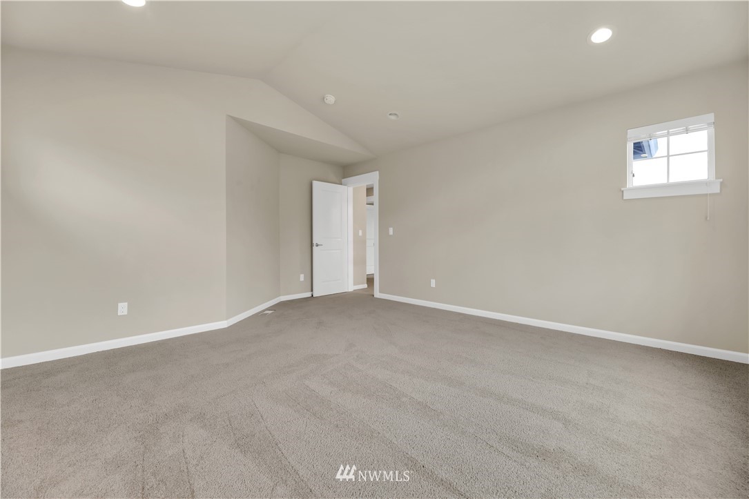 6117 Northeast 1st Street Renton, WA 98059 - Photo 30 of 39 a view of an empty room with a window