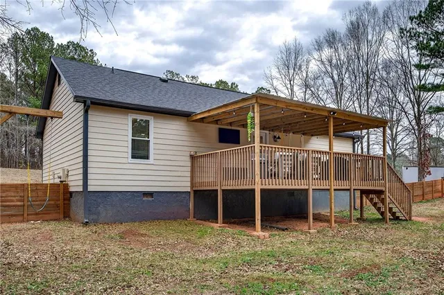 a view of a backyard with a garden