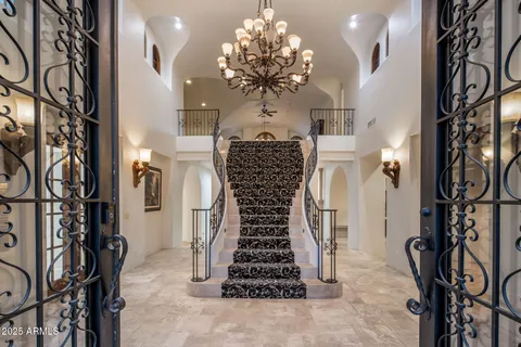 a view of a hall with furniture