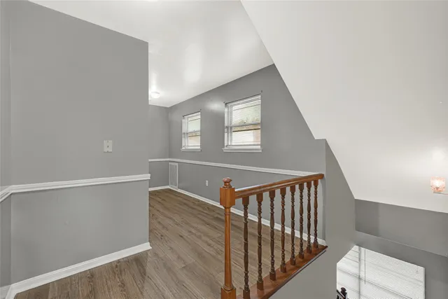 a view of entryway with wooden floor