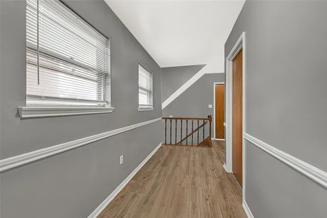 a view of entryway with wooden floor