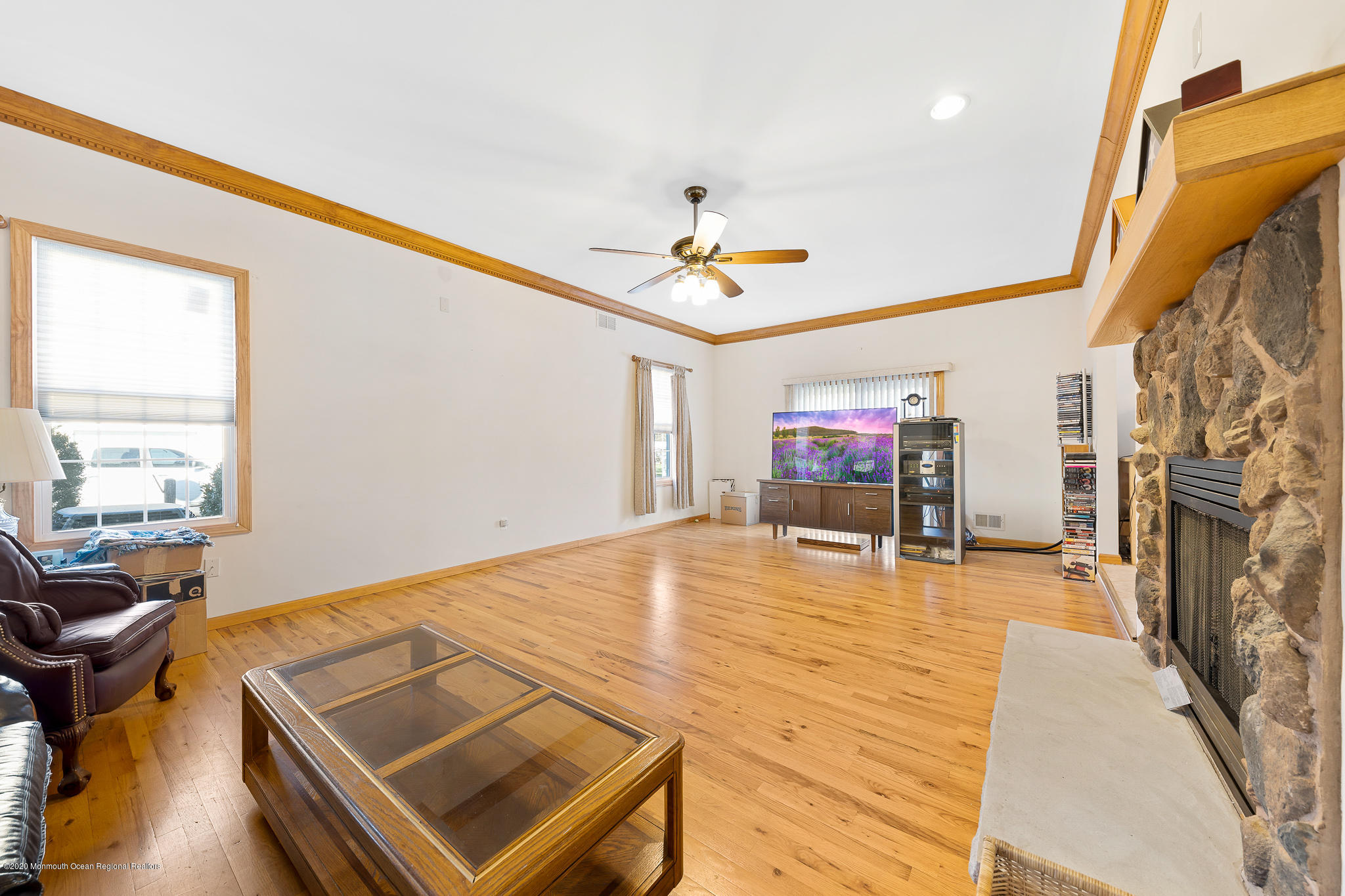291 Frank Applegate Road Jackson, NJ 08527 - Photo 17 of 38 a living room with pool table and a fireplace