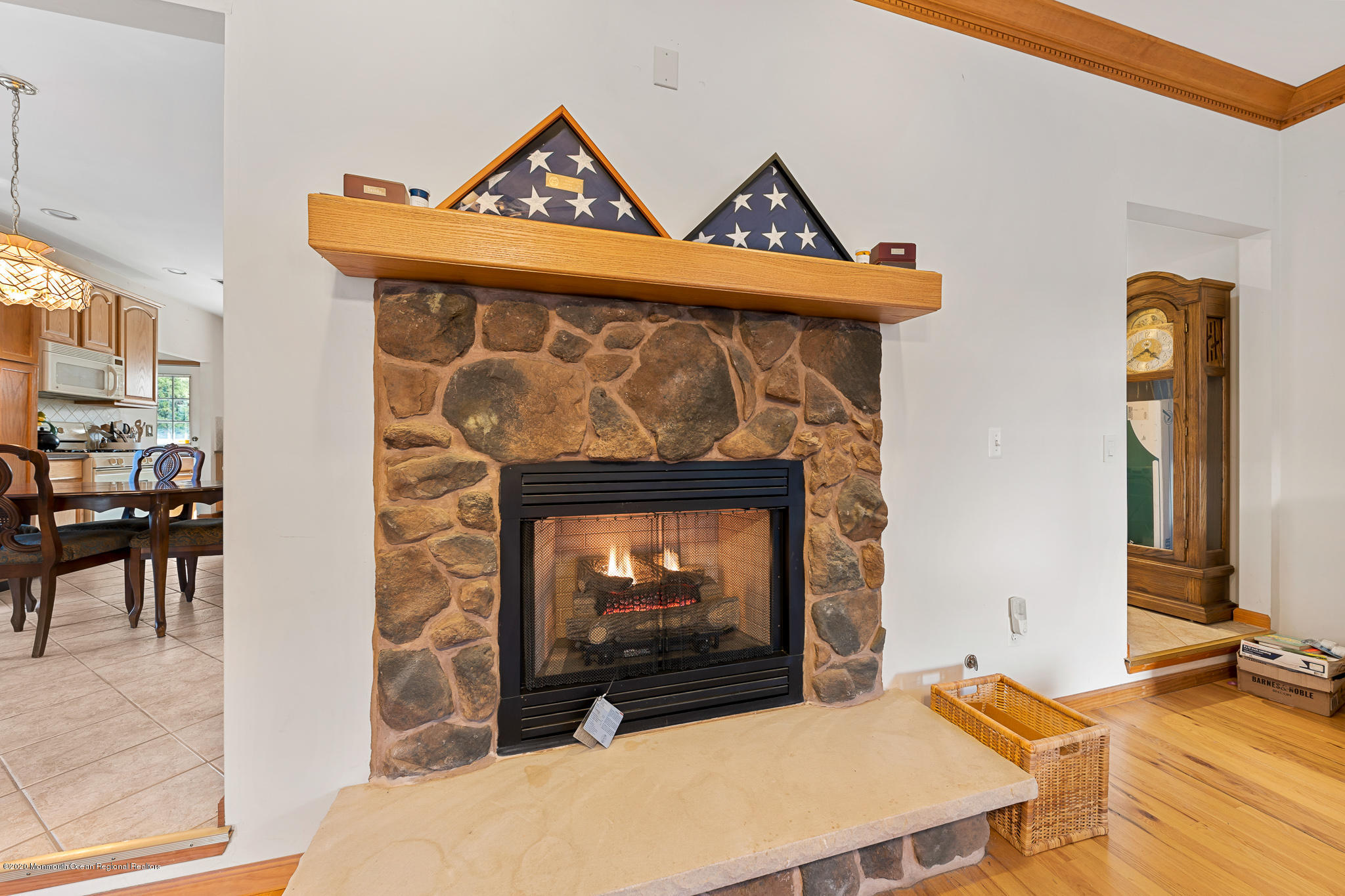 291 Frank Applegate Road Jackson, NJ 08527 - Photo 20 of 38 a living room with furniture a flat screen tv and a fireplace