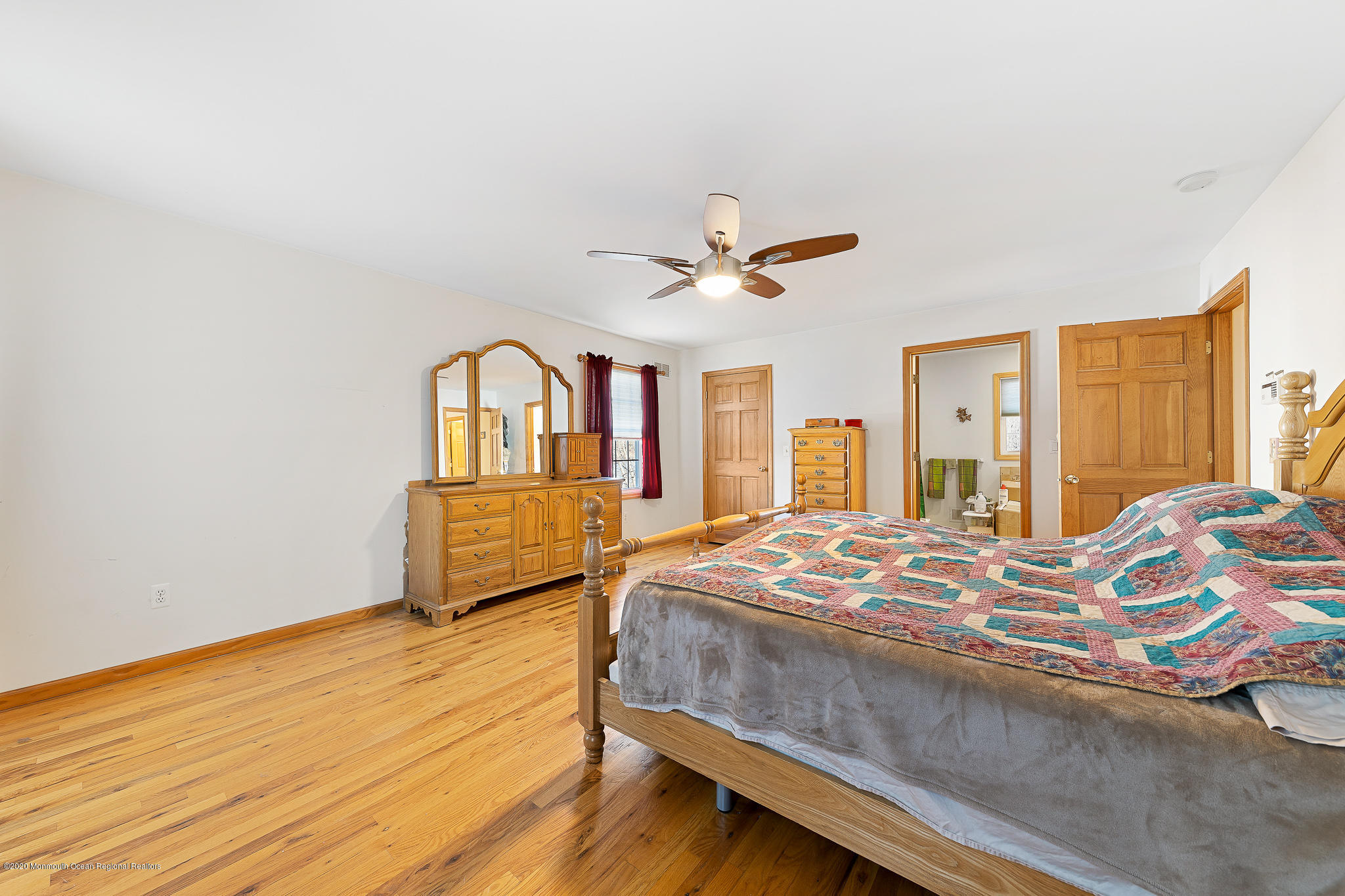 291 Frank Applegate Road Jackson, NJ 08527 - Photo 22 of 38 a bedroom with a bed dresser and a window