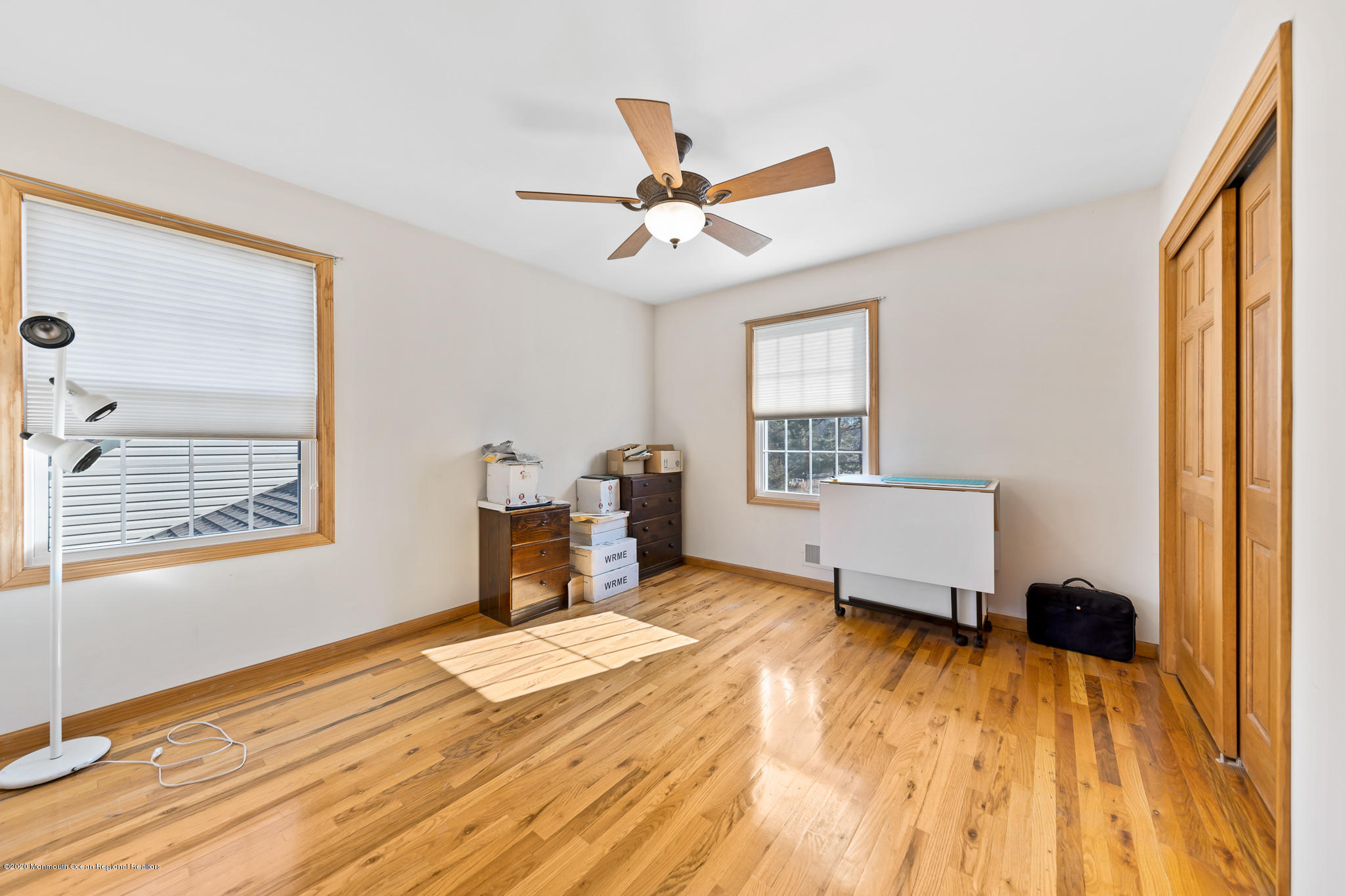 291 Frank Applegate Road Jackson, NJ 08527 - Photo 26 of 38 a bedroom with a bed dresser and a window