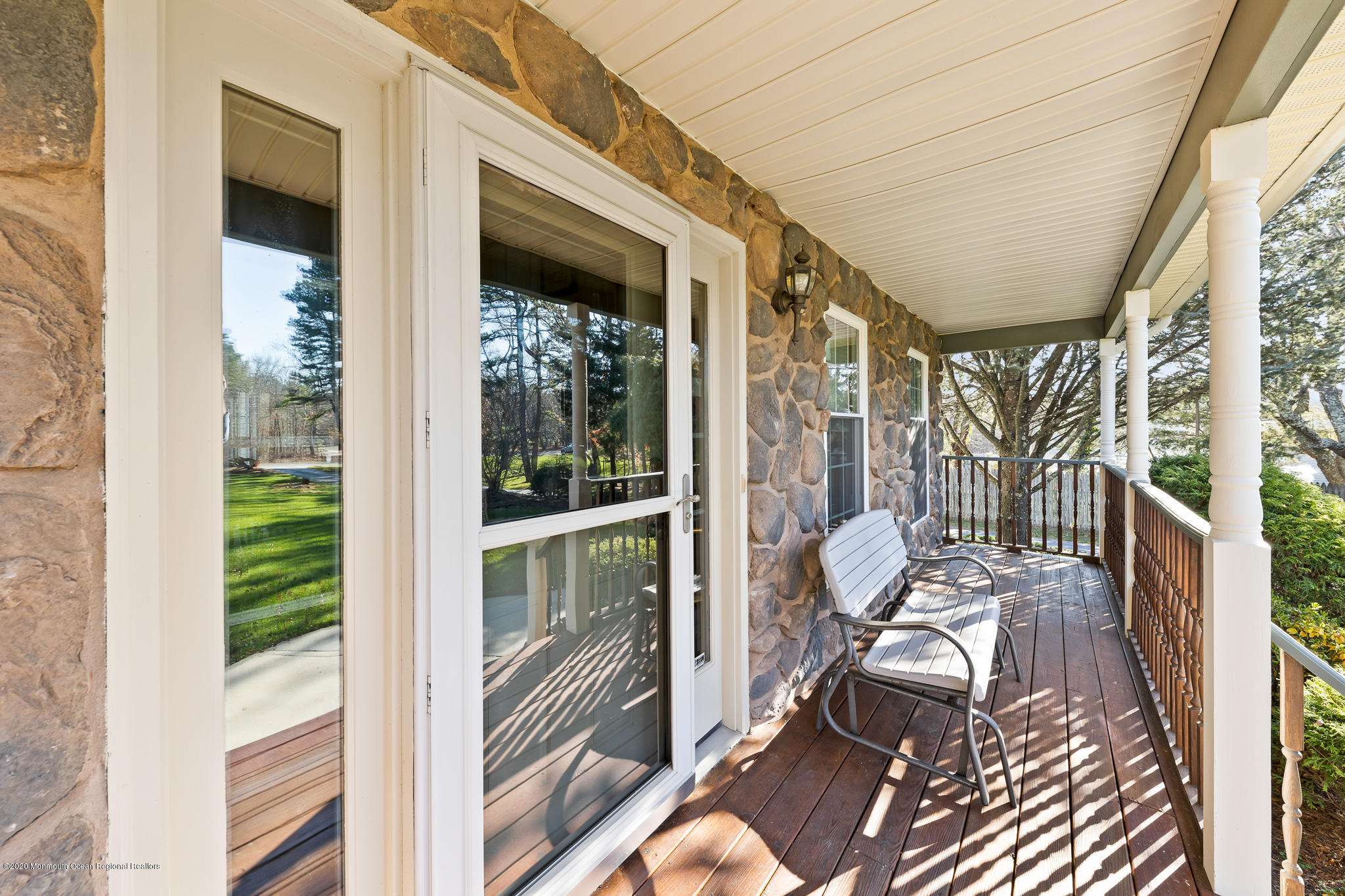 291 Frank Applegate Road Jackson, NJ 08527 - Photo 4 of 38 a balcony view with a large window and outdoor seating