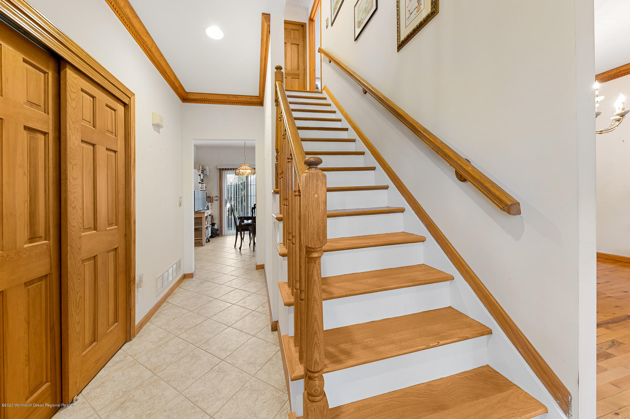 291 Frank Applegate Road Jackson, NJ 08527 - Photo 9 of 38 a view of a hallway with wooden floor and staircase