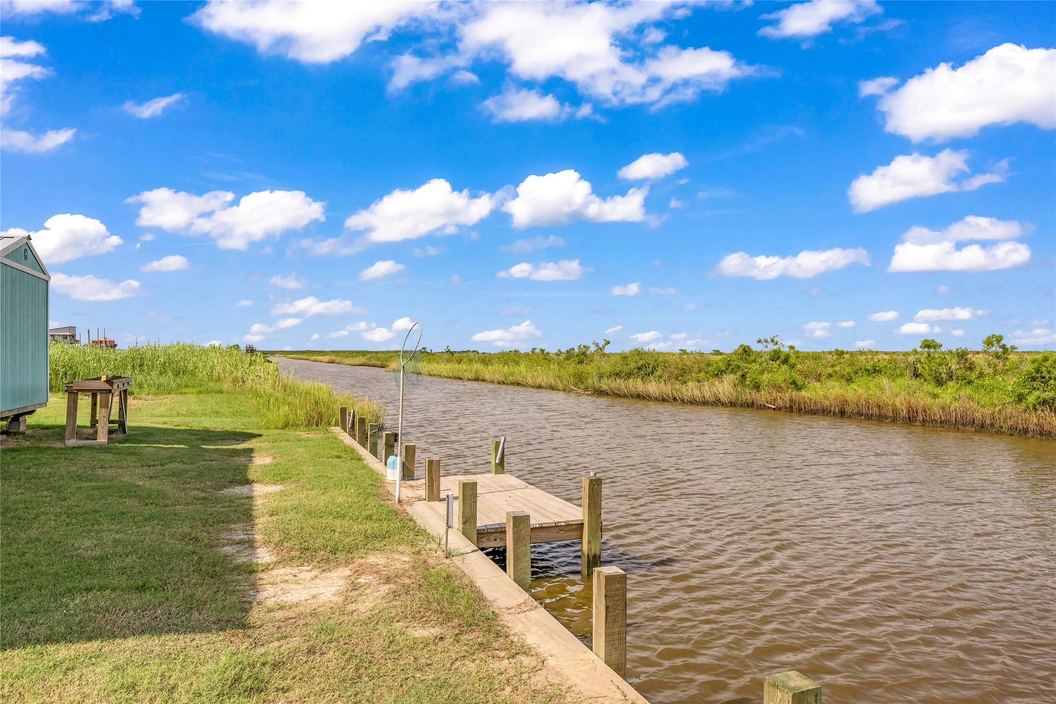 1306 Mabry Port Bolivar, TX 77650 - Photo 1 of 22 a view of a lake