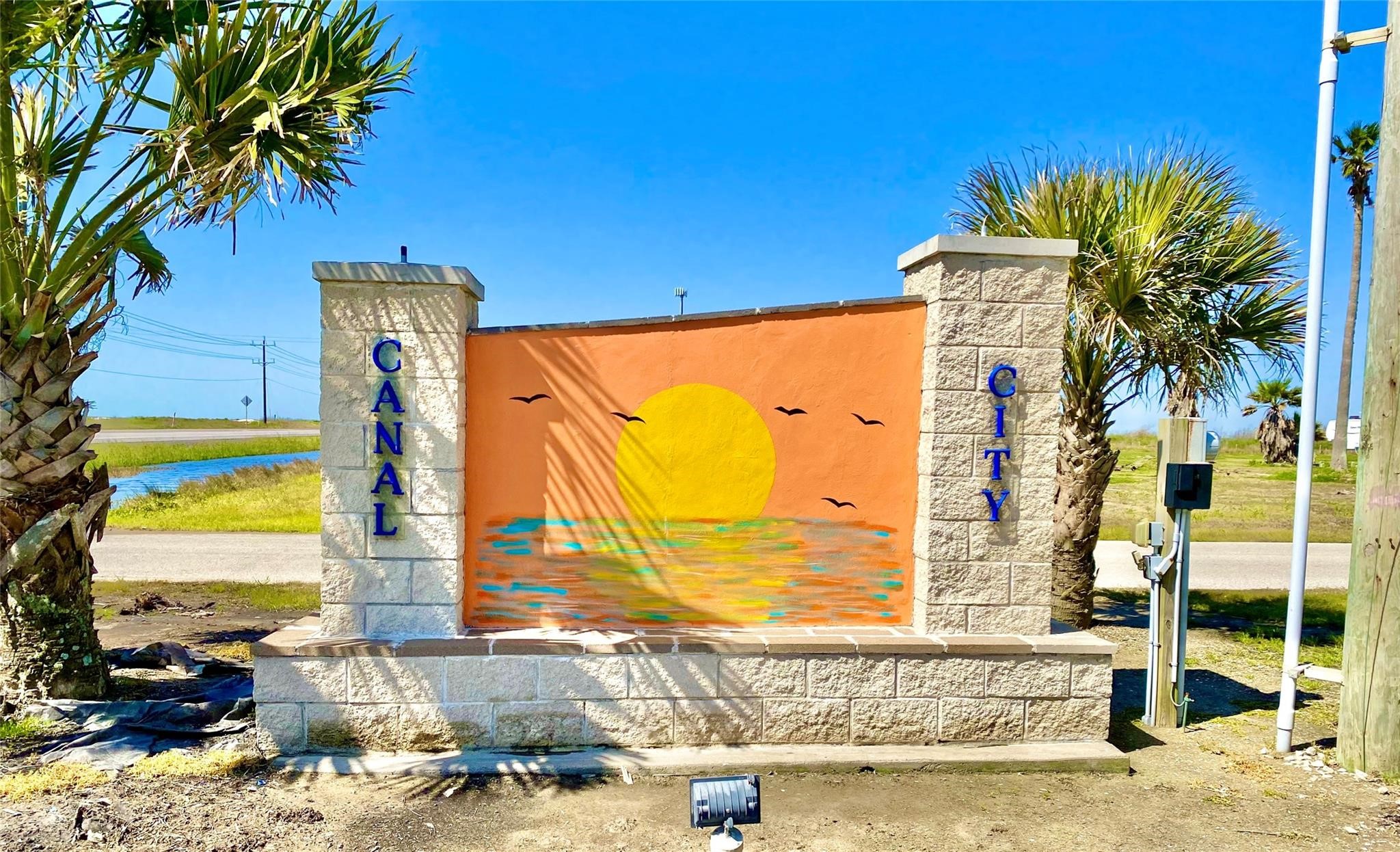 1306 Mabry Port Bolivar, TX 77650 - Photo 22 of 22 a view of a swimming pool with a lawn chairs
