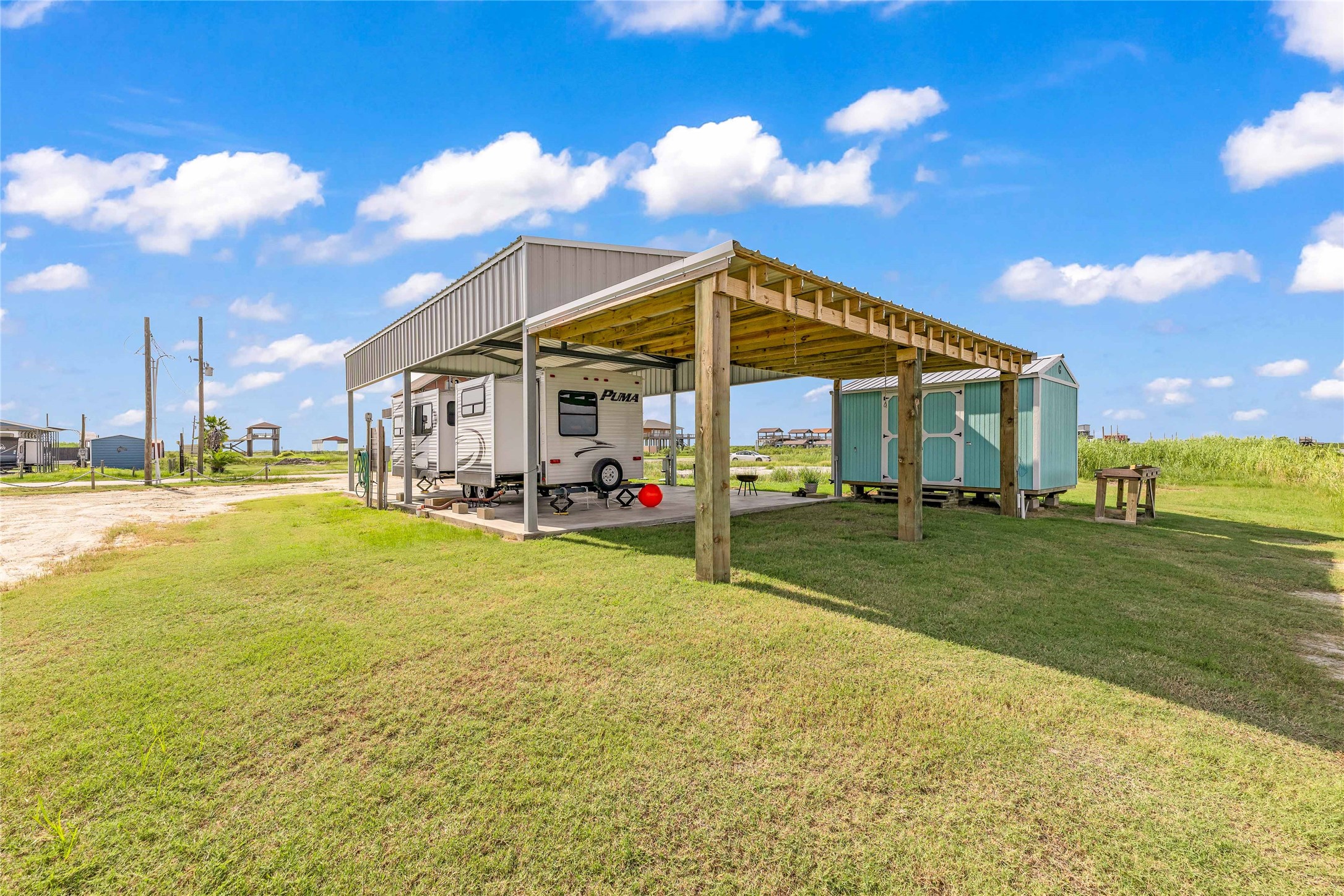 1306 Mabry Port Bolivar, TX 77650 - Photo 4 of 22 a view of a house with a yard