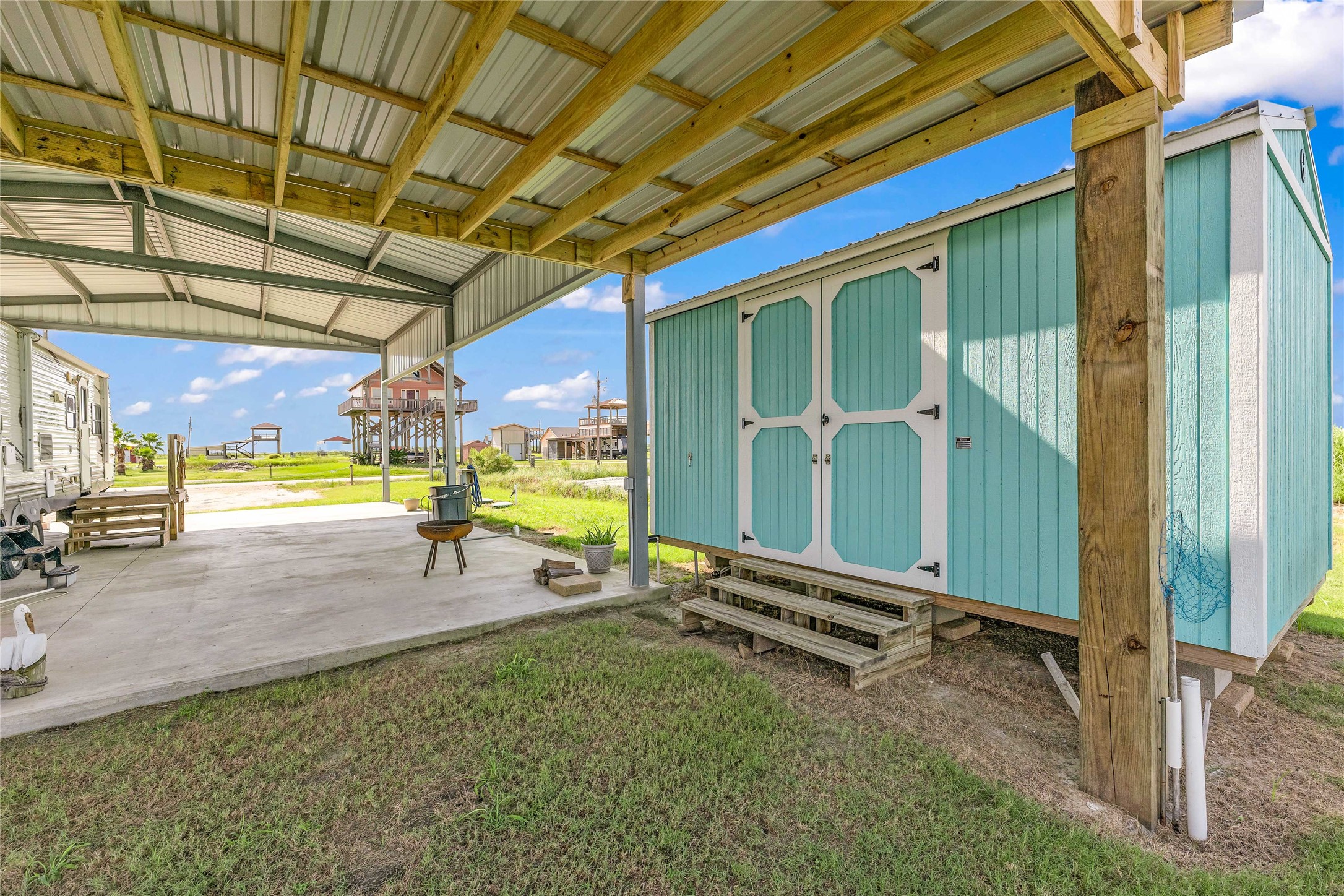 1306 Mabry Port Bolivar, TX 77650 - Photo 6 of 22 a view of a backyard