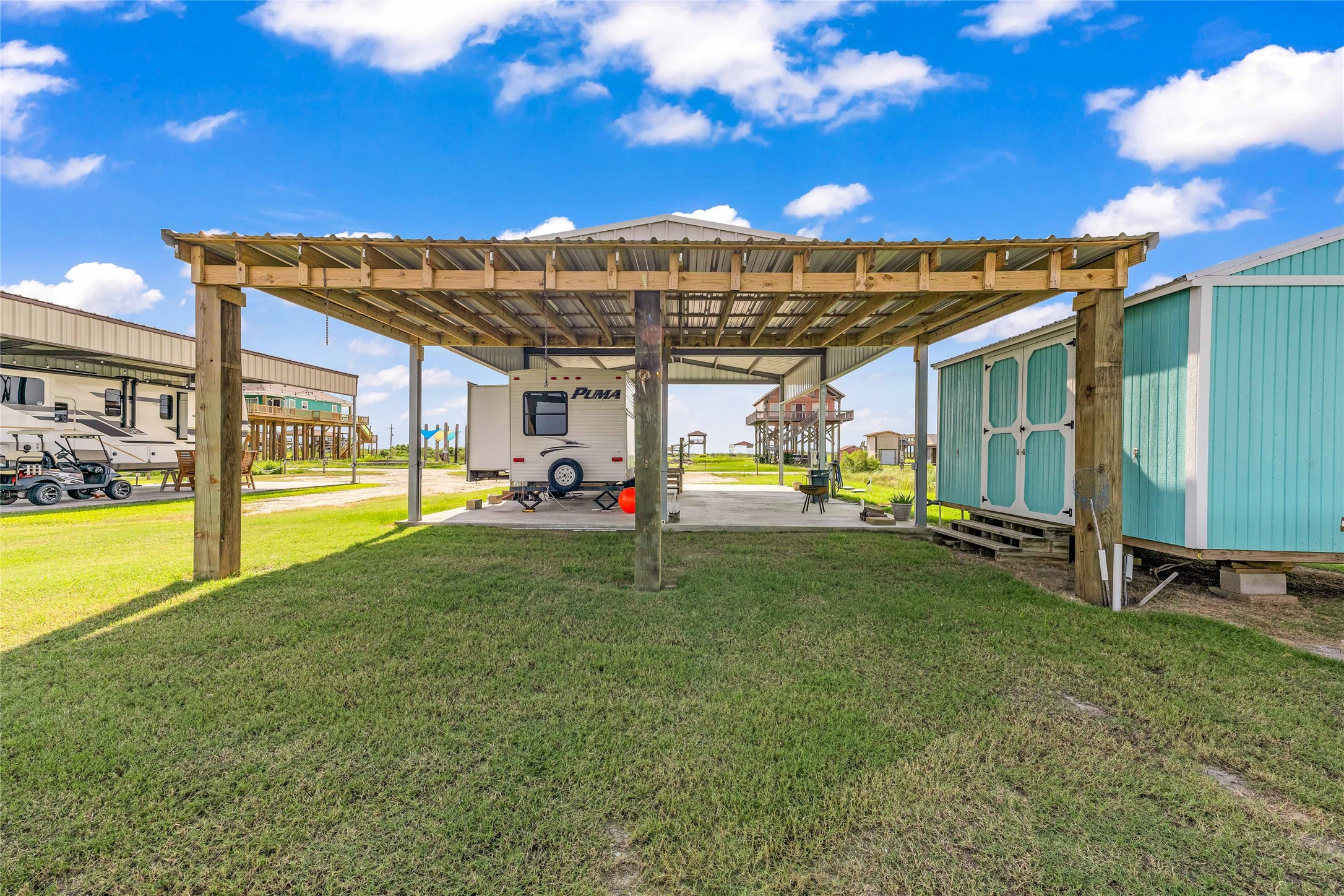 1306 Mabry Port Bolivar, TX 77650 - Photo 7 of 22 a view of a patio with a table and chairs