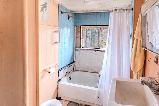 a living room with a couch and a table