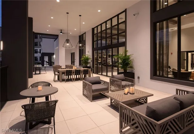 a outdoor space with furniture and a potted plant