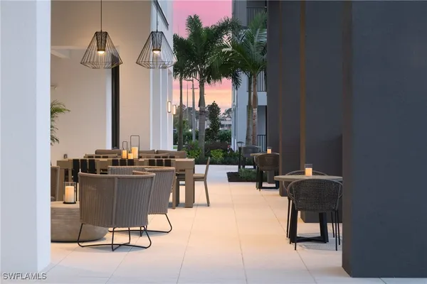 a view of a workspace with furniture