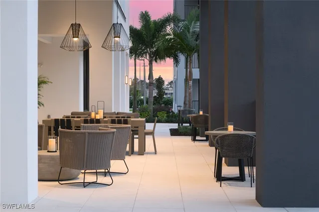 a view of a workspace with furniture