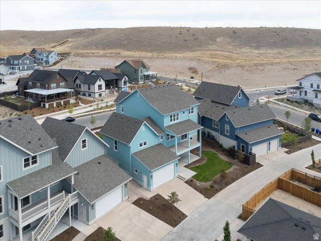 7189 South Sage Road, Unit 214 West Jordan, UT 84081 - Photo 5 of 29 Newly constructed residential neighborhood featuring modern architectural styles