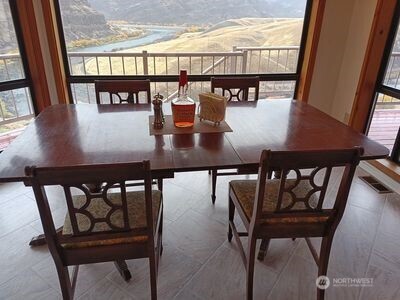 37896 Snake River Road Asotin, WA 99402 - Photo 16 of 23 a view of a chairs and table in a balcony