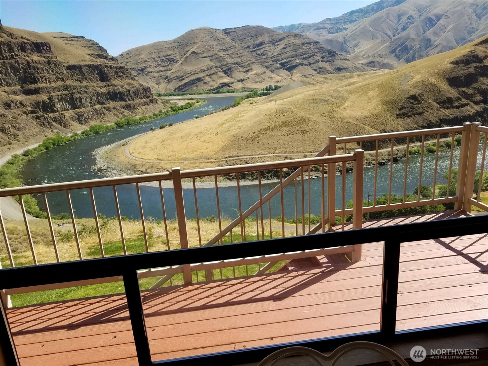 37896 Snake River Road Asotin, WA 99402 - Photo 2 of 23 a view of a balcony with a couple of water view