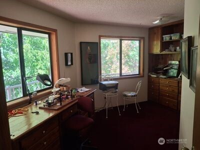 37896 Snake River Road Asotin, WA 99402 - Photo 21 of 23 a room with furniture and large windows