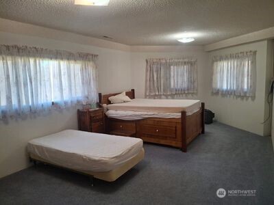 37896 Snake River Road Asotin, WA 99402 - Photo 10 of 23 a bedroom with a bed and window