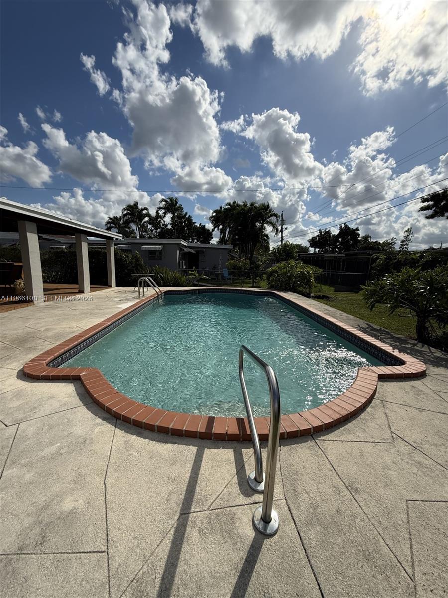 4012 Southwest 102nd Court Miami, FL 33165 - Photo 1 of 10 swimming pool view